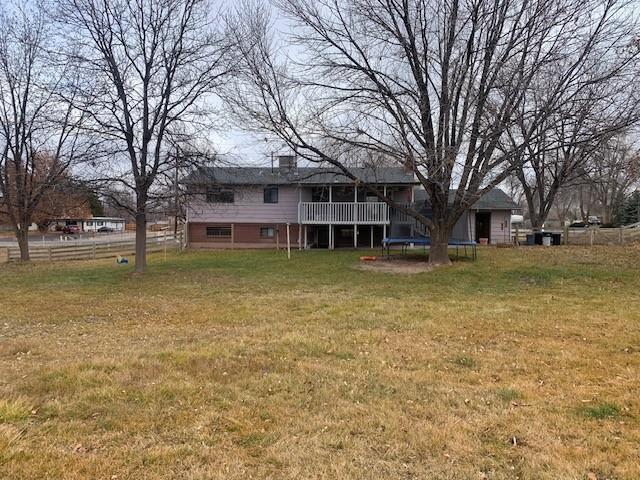 581-22 22 1/2 Road Grand Junction, CO 81507 - Photo 25 of 26 a view of a house with a yard and sitting area