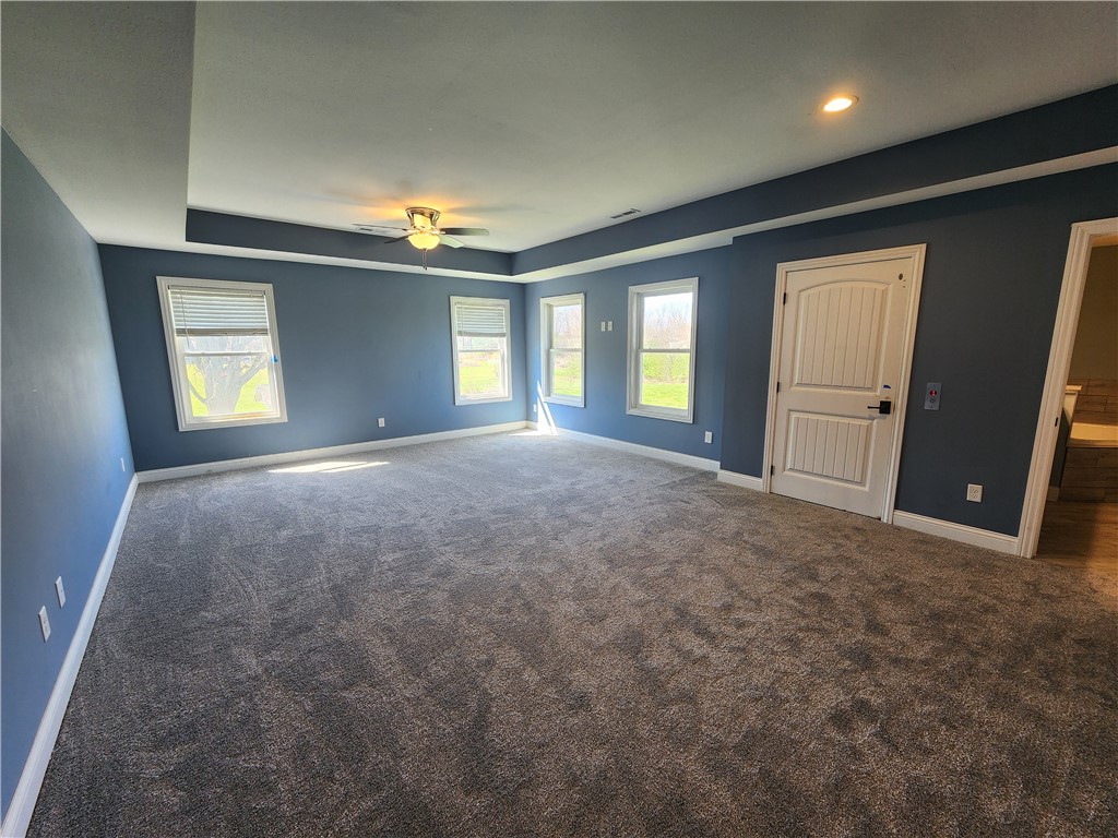 7441 Dodson Road Brookville, OH 45309 - Photo 19 of 50 An inviting room features plush carpeting and abundant natural light.