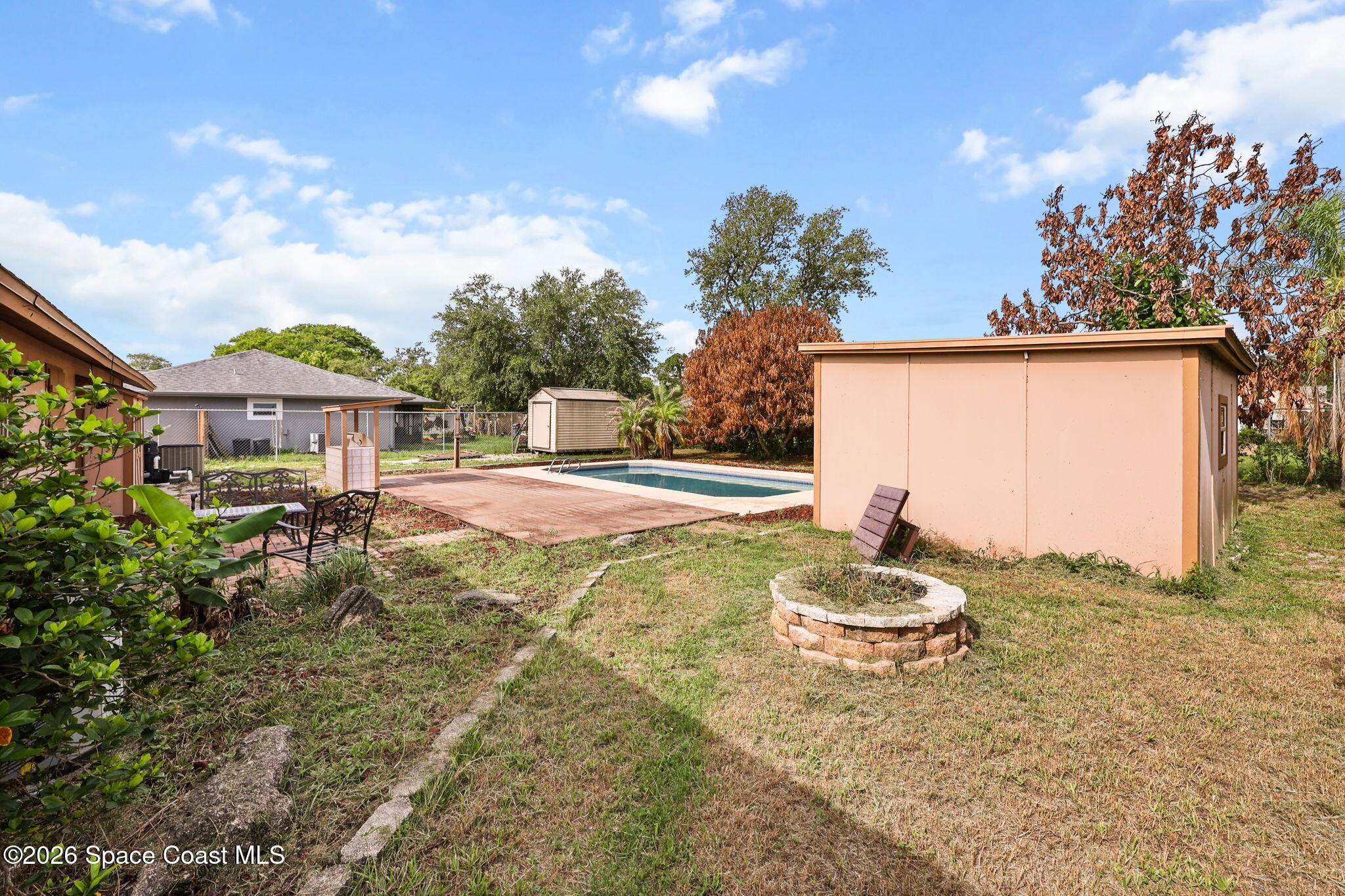 7256 Bright Avenue Cocoa, FL 32927 - Photo 24 of 29 Big yard, fire pit, shed