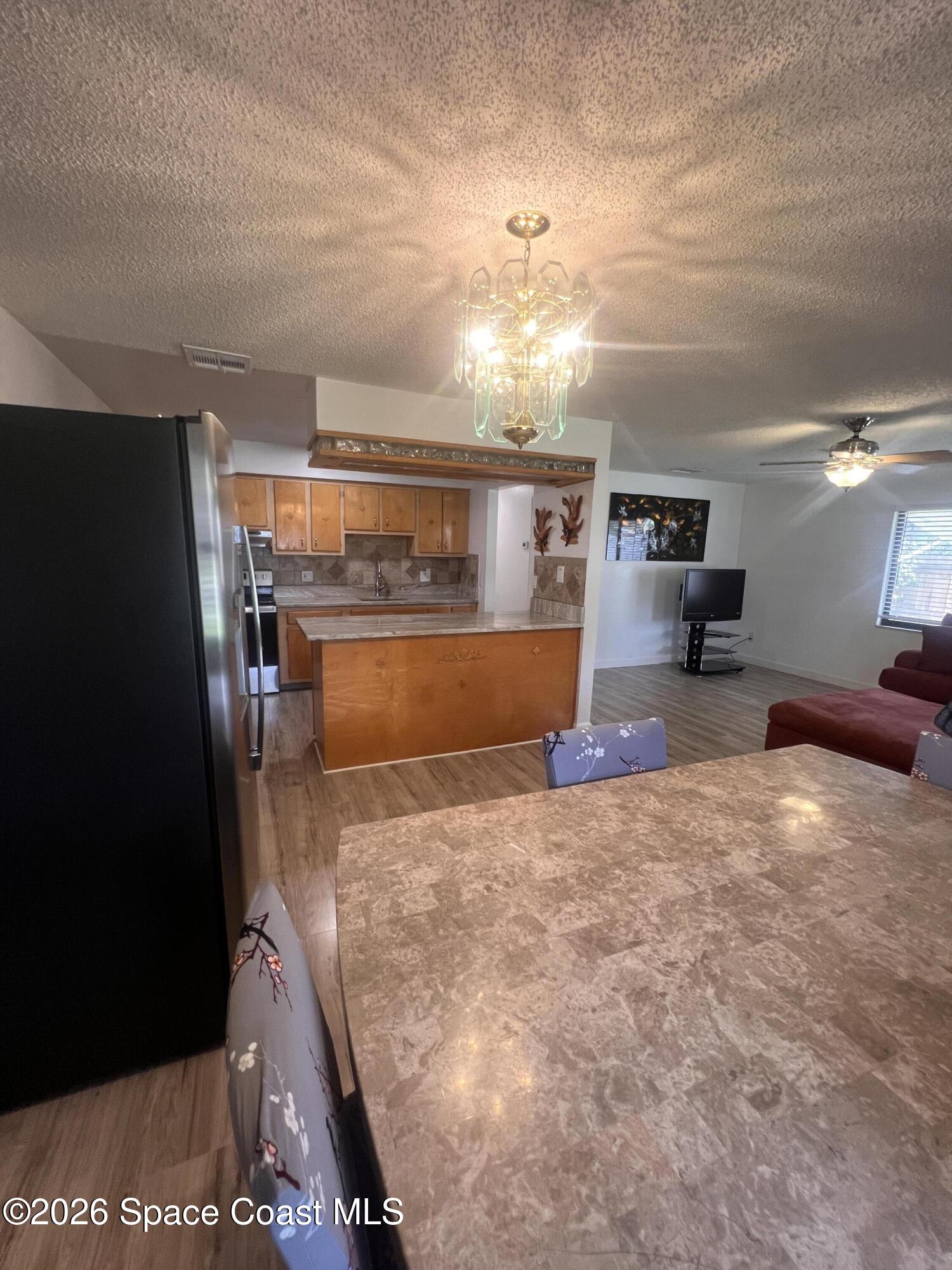 2796 Lancaster Road Melbourne, FL 32935 - Photo 7 of 29 20260529_135713285_iOS