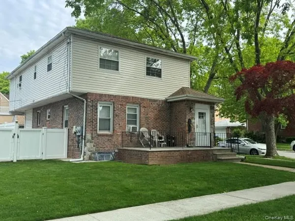 a front view of house with yard