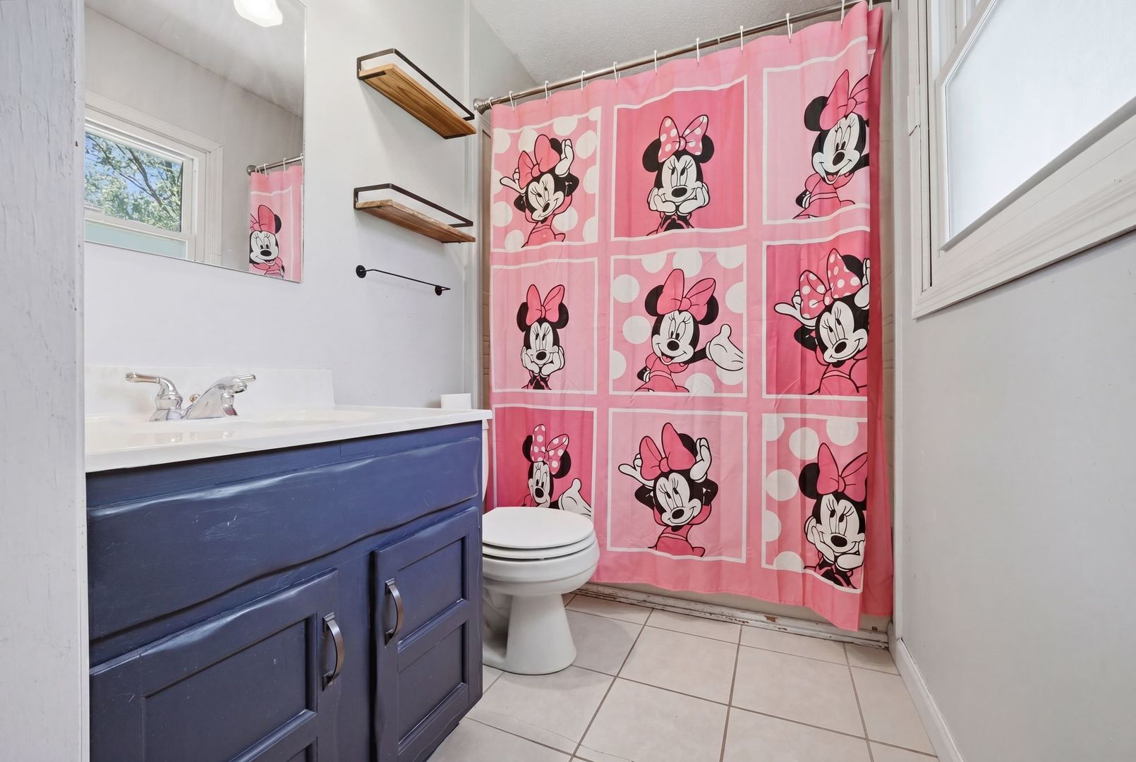 5645 Beebe Drive Rochelle, IL 61068 - Photo 27 of 43 a bathroom with a toilet and a sink