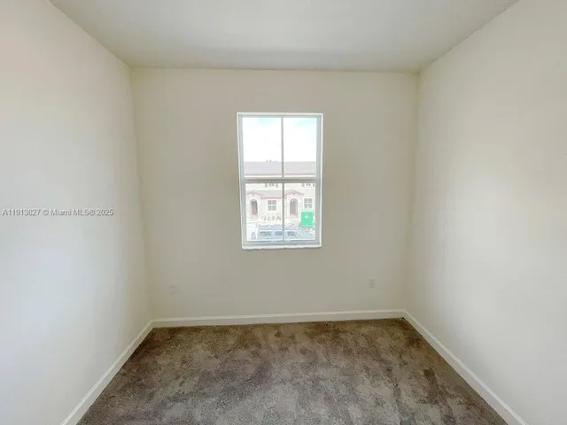 an empty room with an entryway