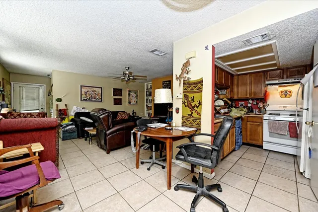 a bedroom with bed and window