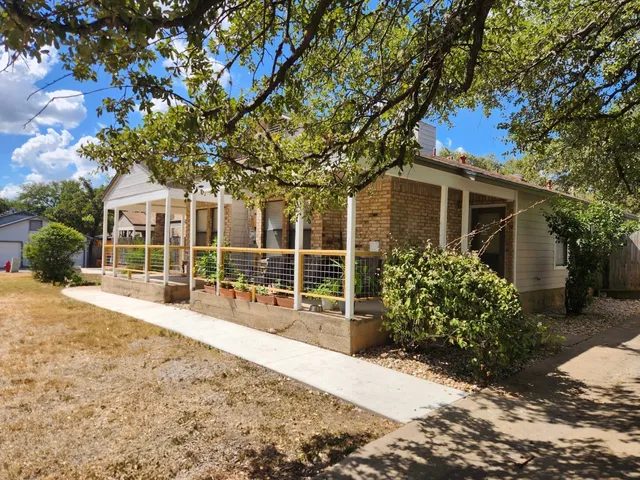 a view of a house with a patio