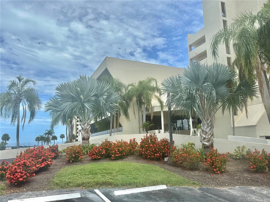 6009 Sea Ranch Drive, Unit 314 Hudson, FL 34667 - Photo 2 of 66 a front view of a house with garden