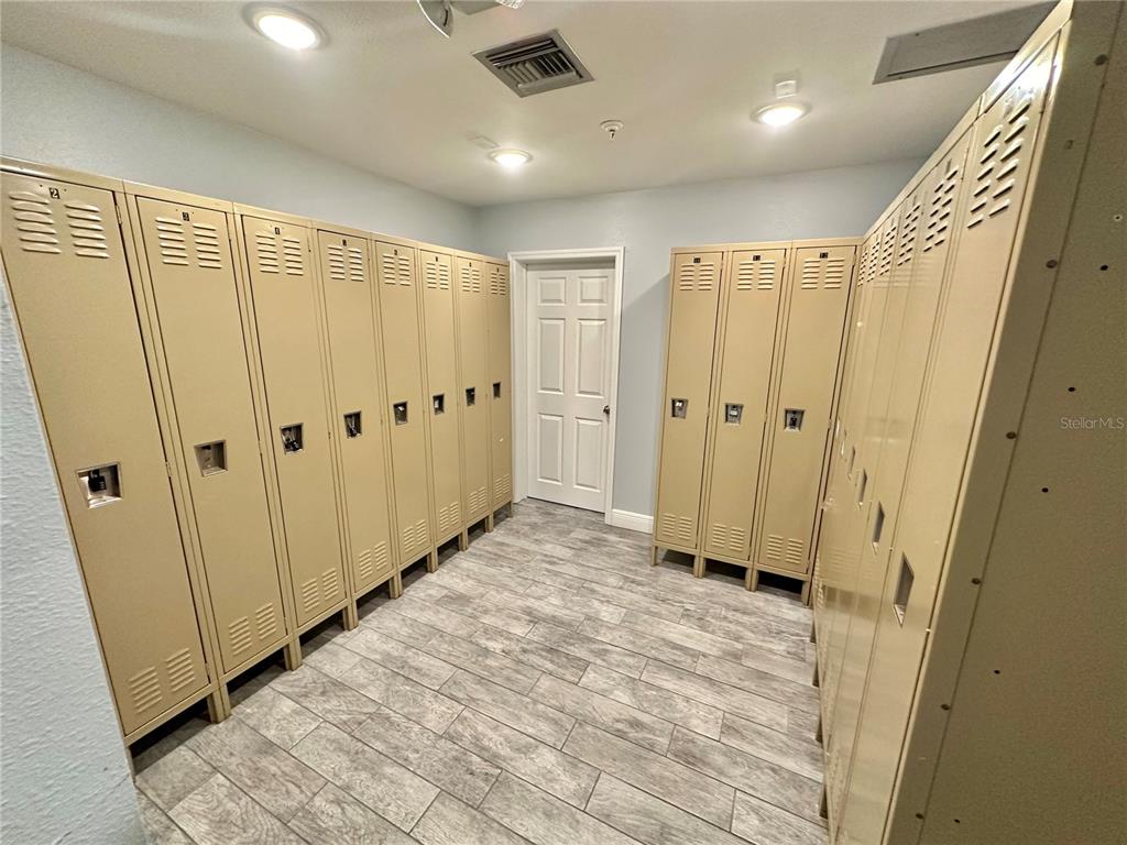 6009 Sea Ranch Drive, Unit 314 Hudson, FL 34667 - Photo 52 of 66 a view of a hallway with white doors
