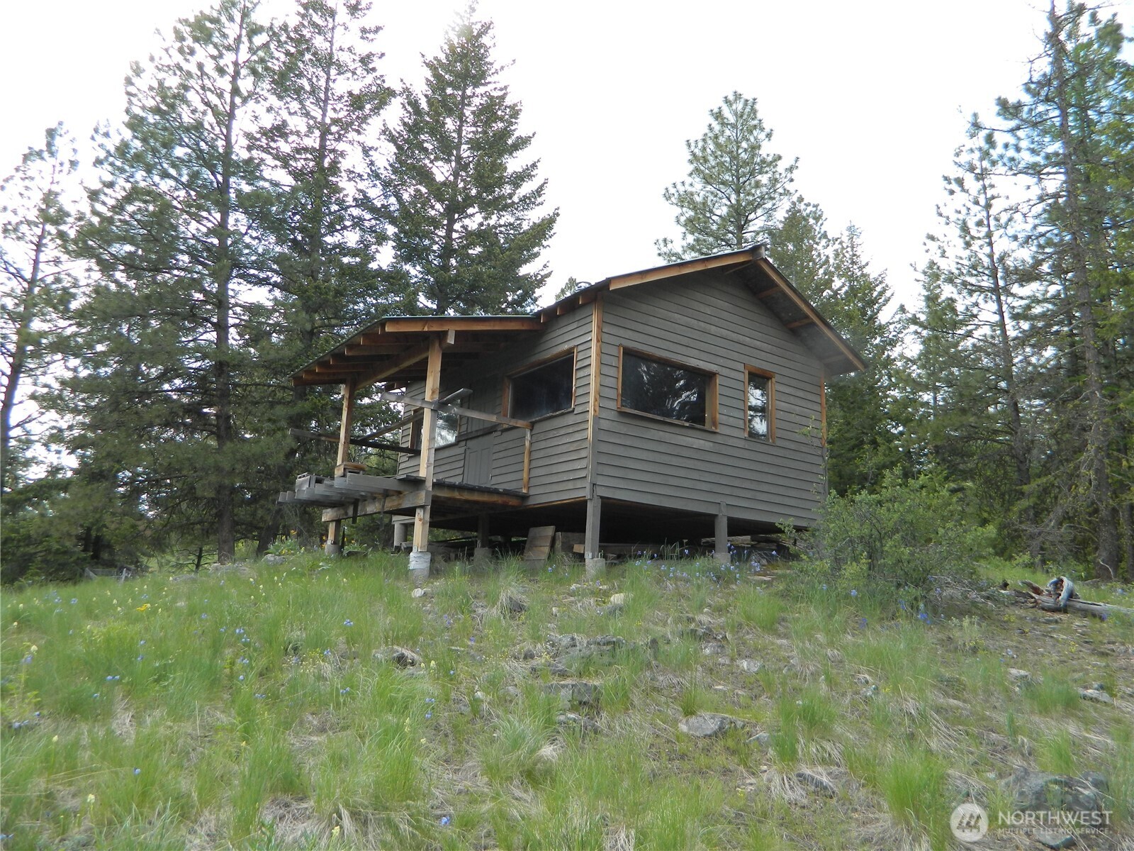 0 Blue Meadow Road Tonasket, WA 98855 - Photo 14 of 26 a backyard of a house with table and chairs