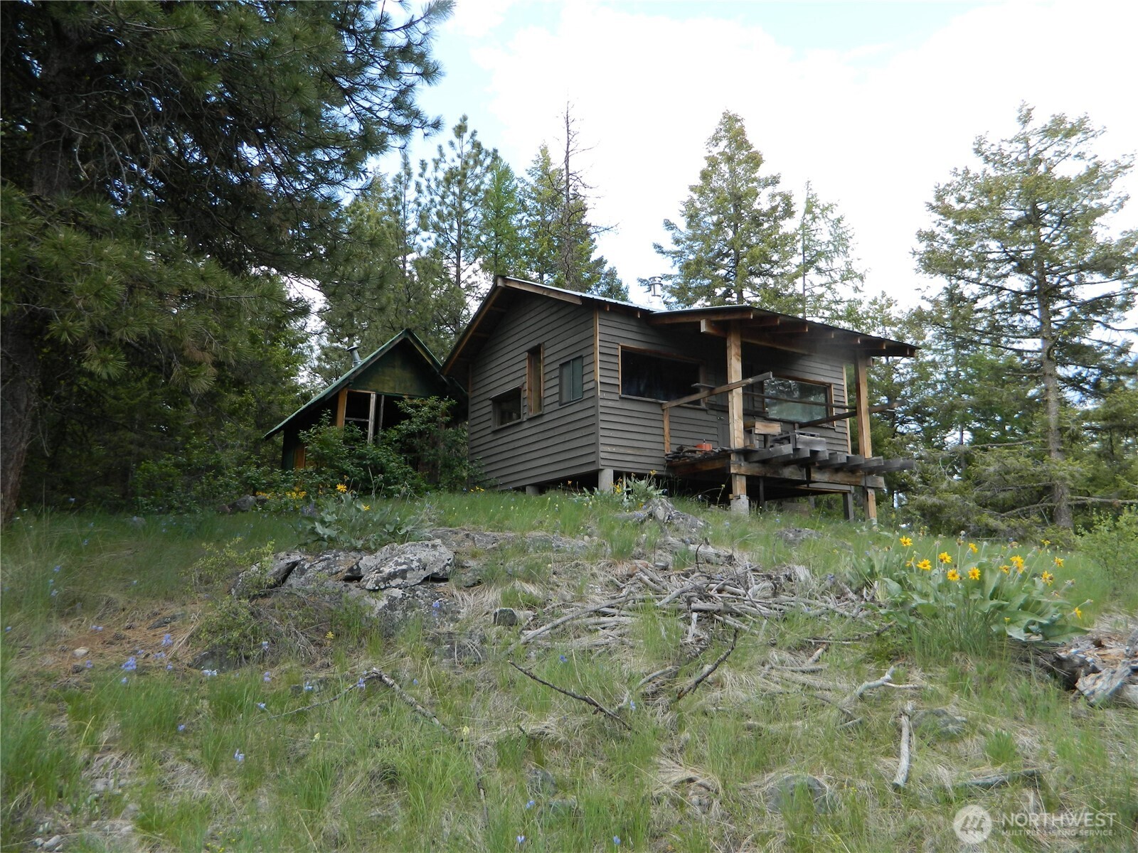 0 Blue Meadow Road Tonasket, WA 98855 - Photo 15 of 26 a backyard of a house with seating space