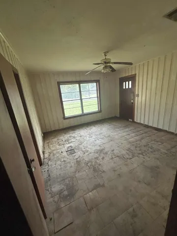 an empty room with windows