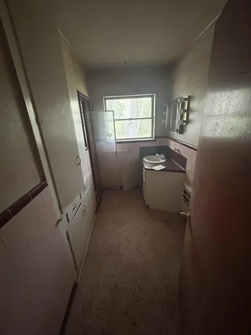 a room with window and furniture