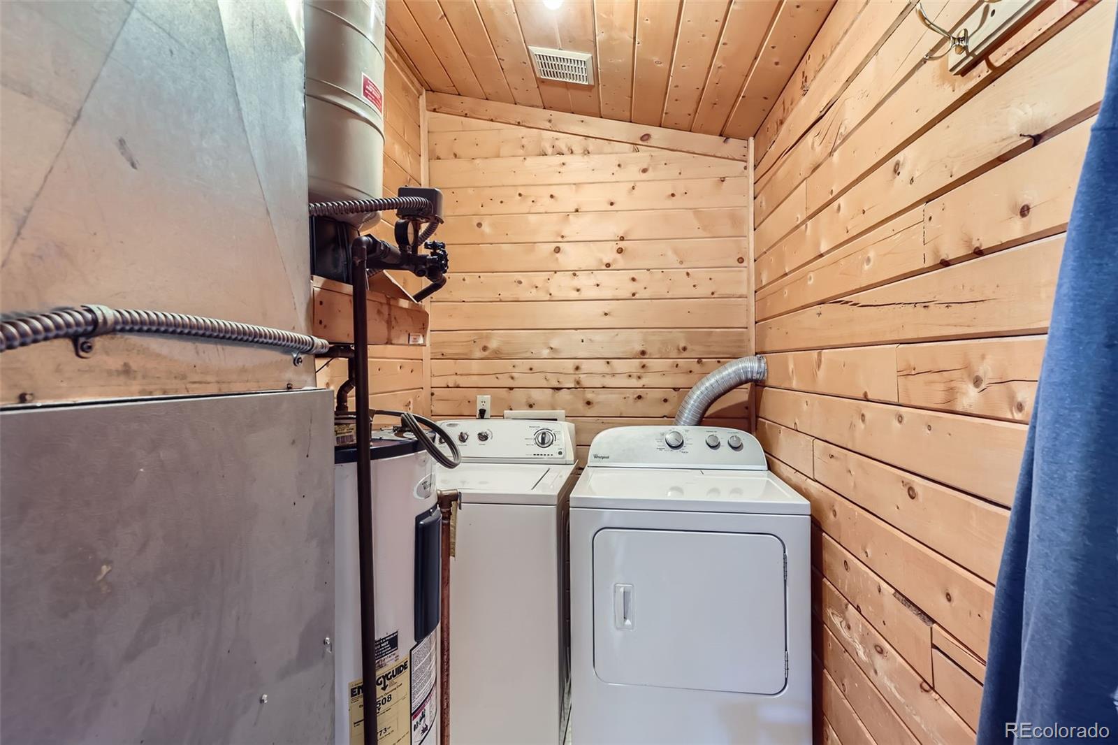 398 Gross Road Bailey, CO 80421 - Photo 23 of 28 a utility room with dryer and washer