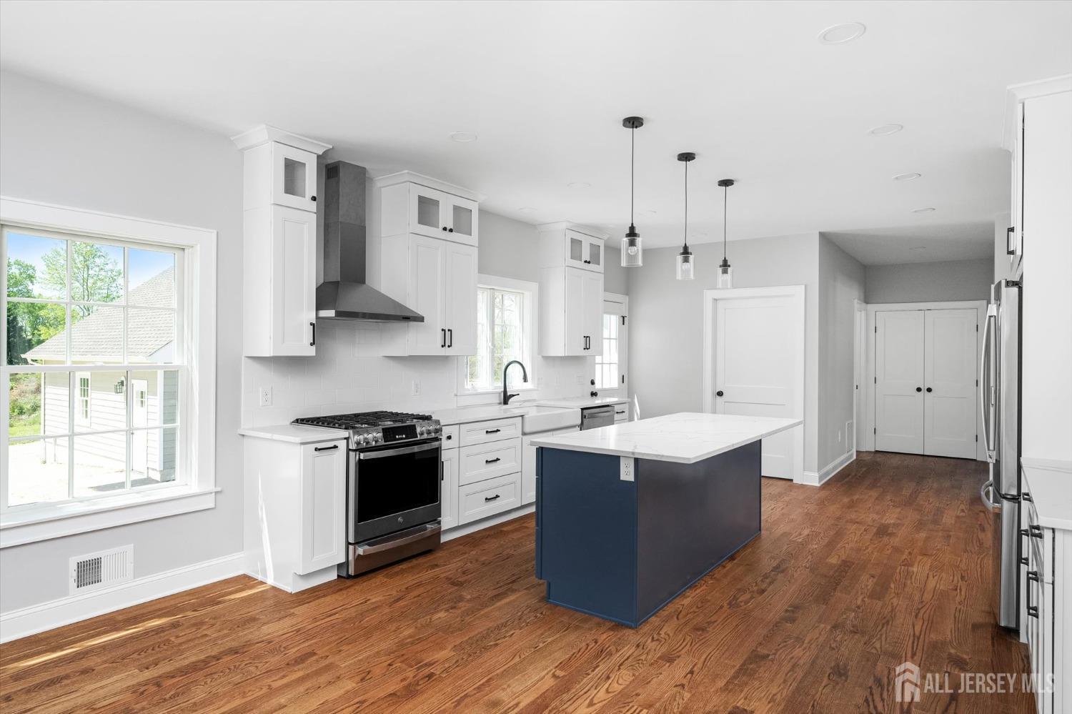 440 Ellisdale Road Chesterfield, NJ 08515 - Photo 11 of 42 a kitchen with stainless steel appliances granite countertop a stove and a sink