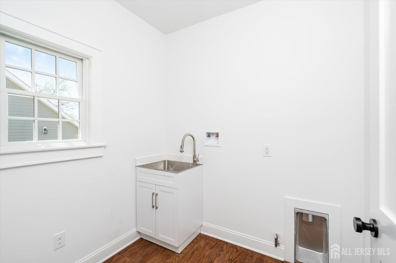 440 Ellisdale Road Chesterfield, NJ 08515 - Photo 17 of 42 a bathroom with a sink and a window
