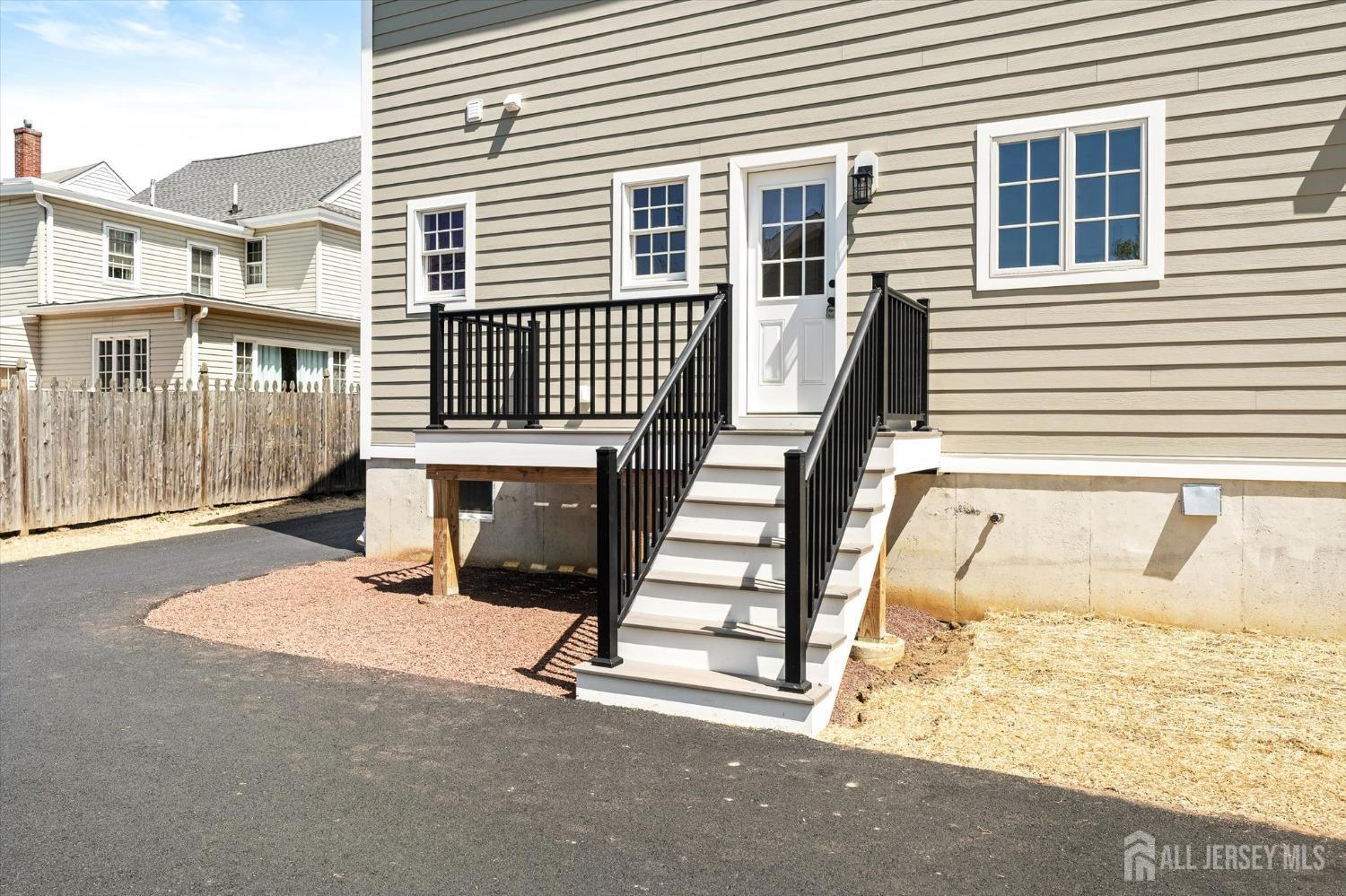 440 Ellisdale Road Chesterfield, NJ 08515 - Photo 37 of 42 a view of a patio with a table and chairs