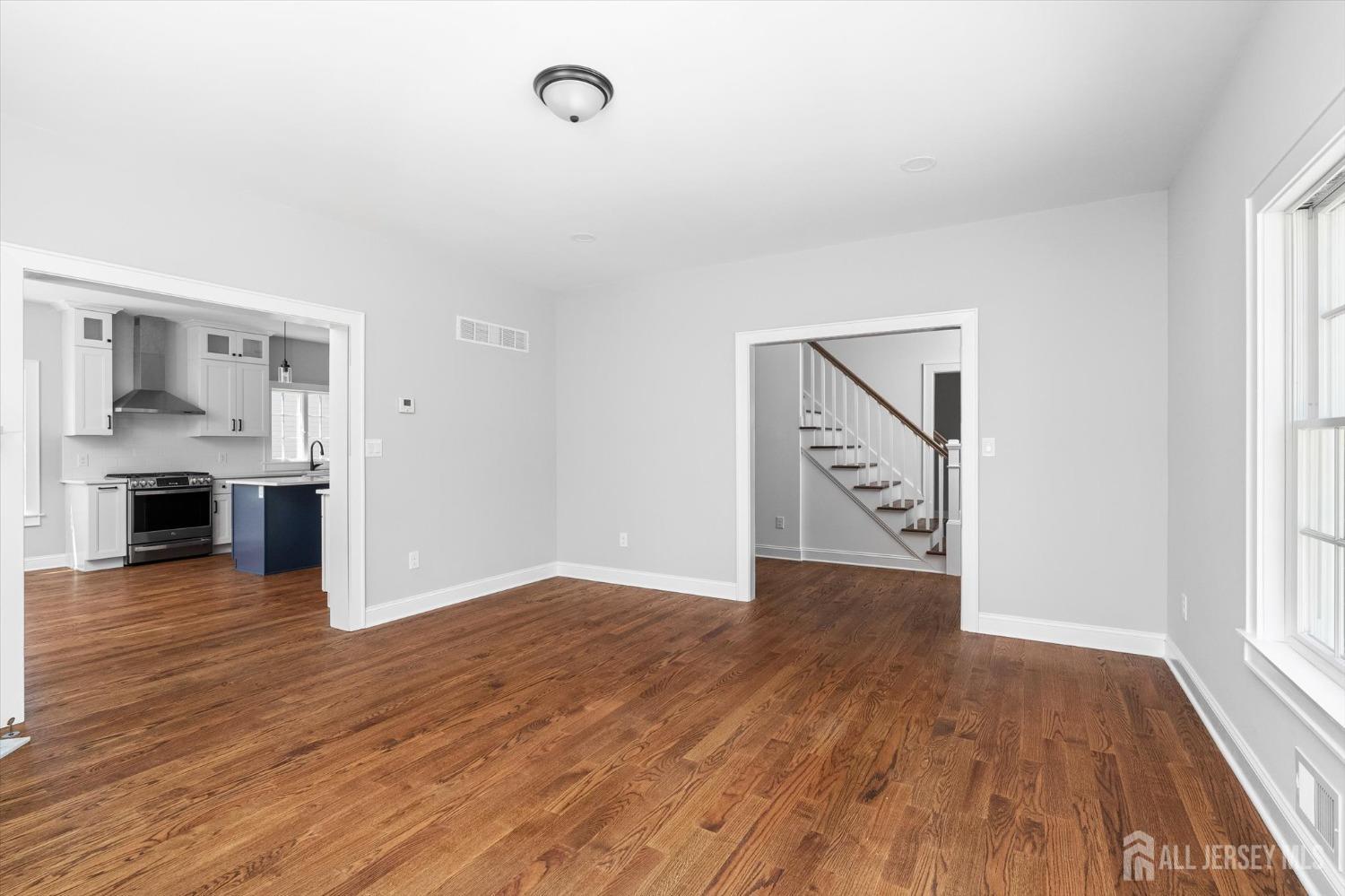 440 Ellisdale Road Chesterfield, NJ 08515 - Photo 9 of 42 wooden floor in an empty room with a window