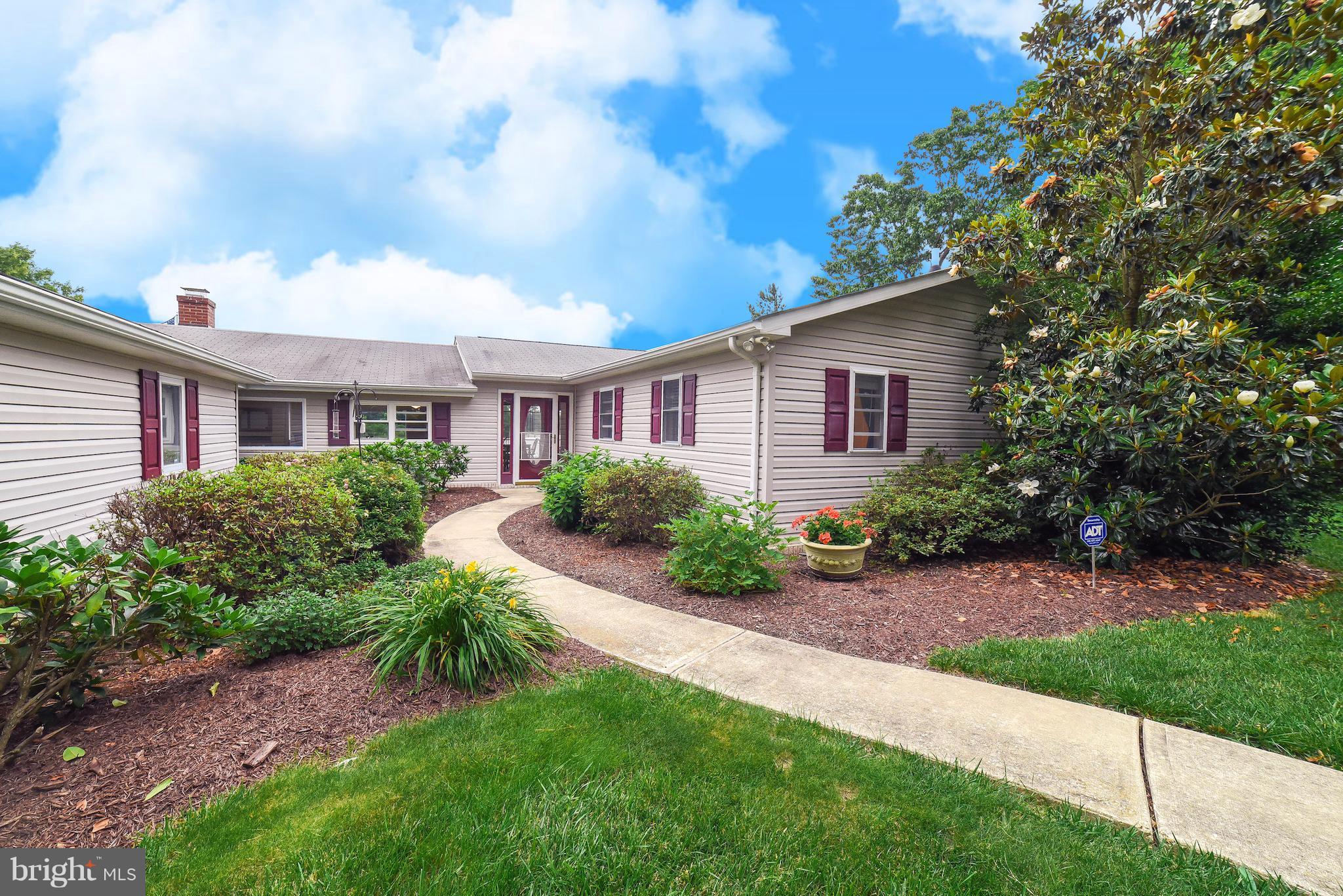 16215 Osprey Cove Ln Ridge Ridge, MD 20680 - Photo 12 of 30 a view of a yard in front of house
