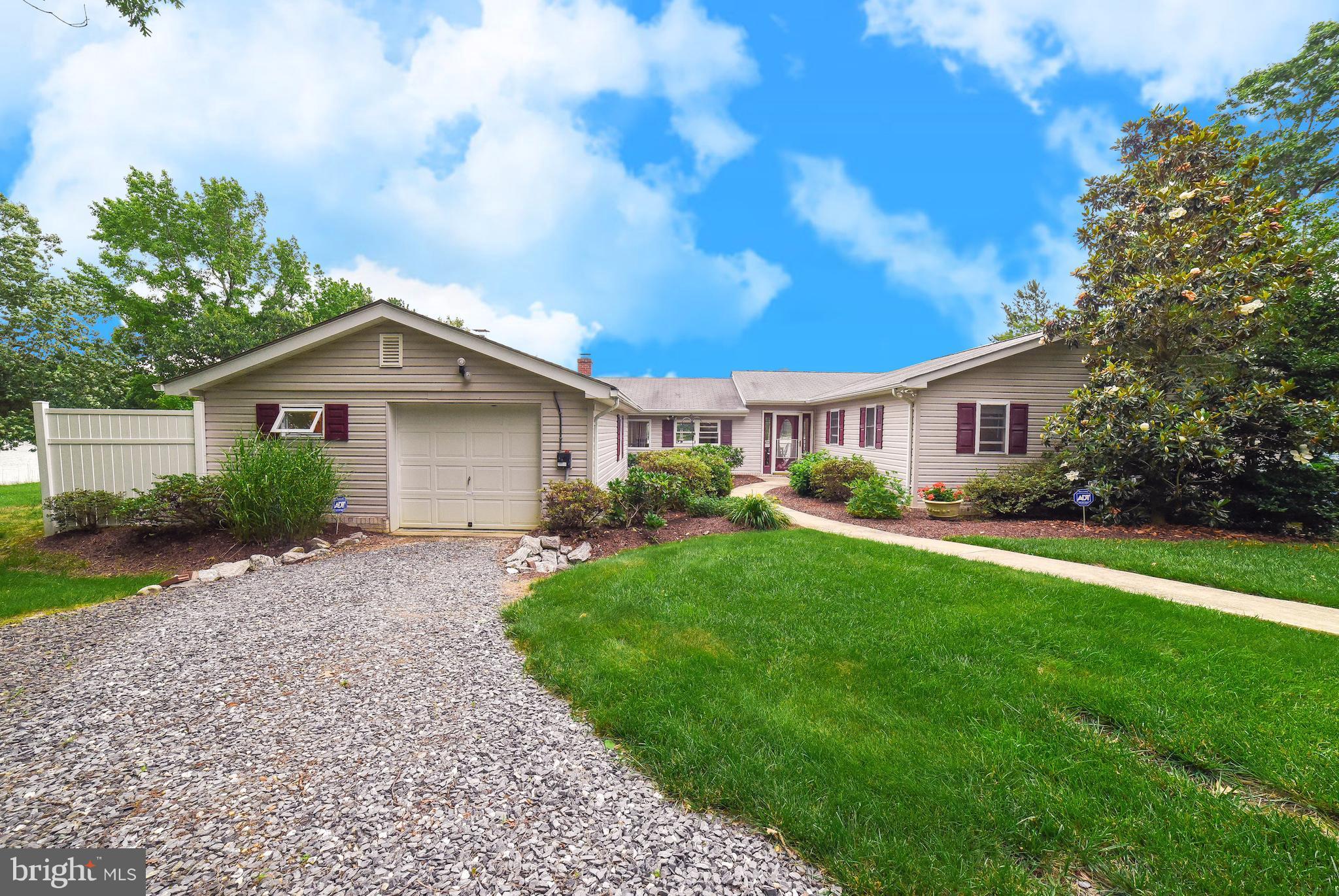 16215 Osprey Cove Ln Ridge Ridge, MD 20680 - Photo 13 of 30 a view of a house and garden