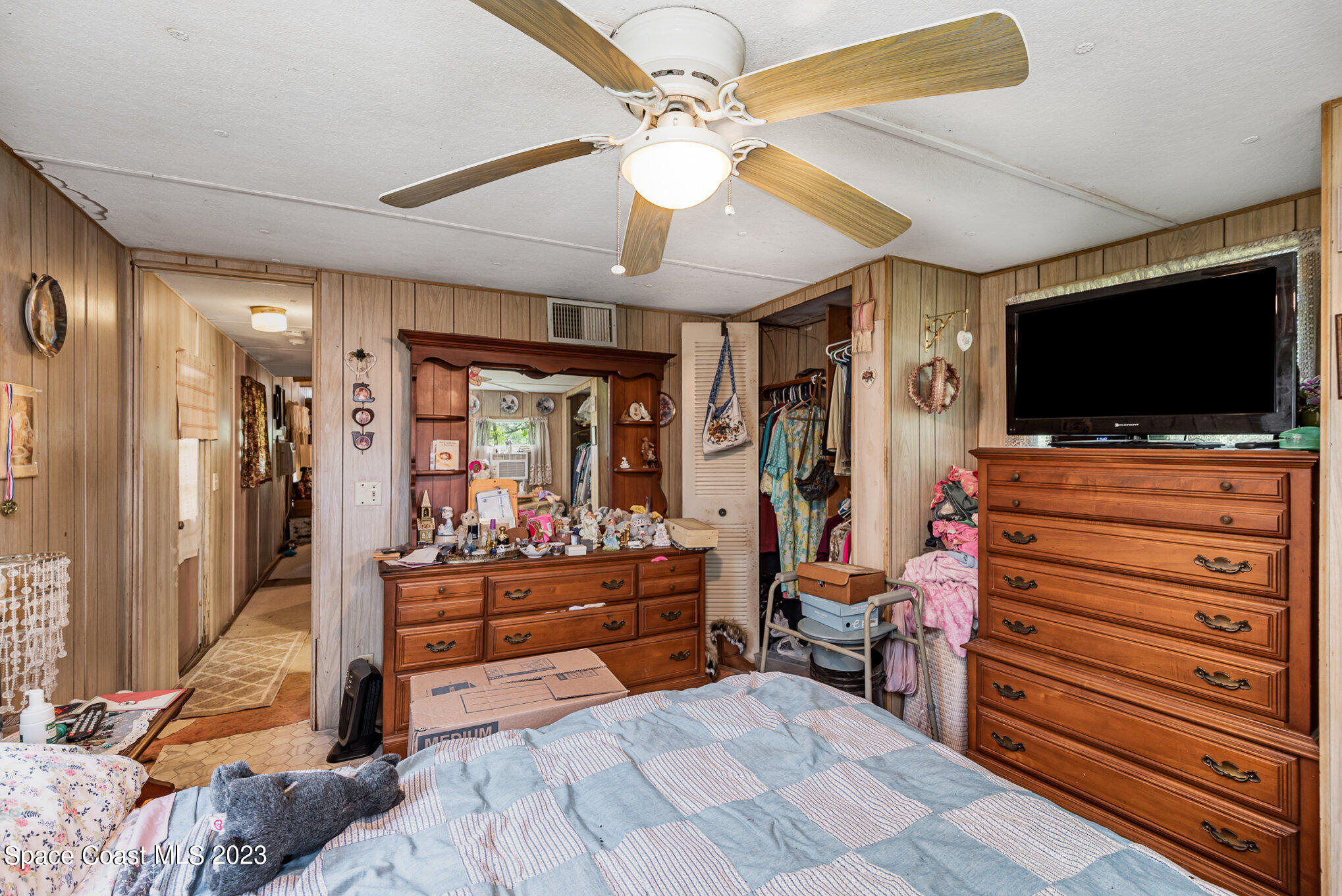 4173 Aurantia Road Mims, FL 32754 - Photo 13 of 23 a room with furniture and flat screen tv