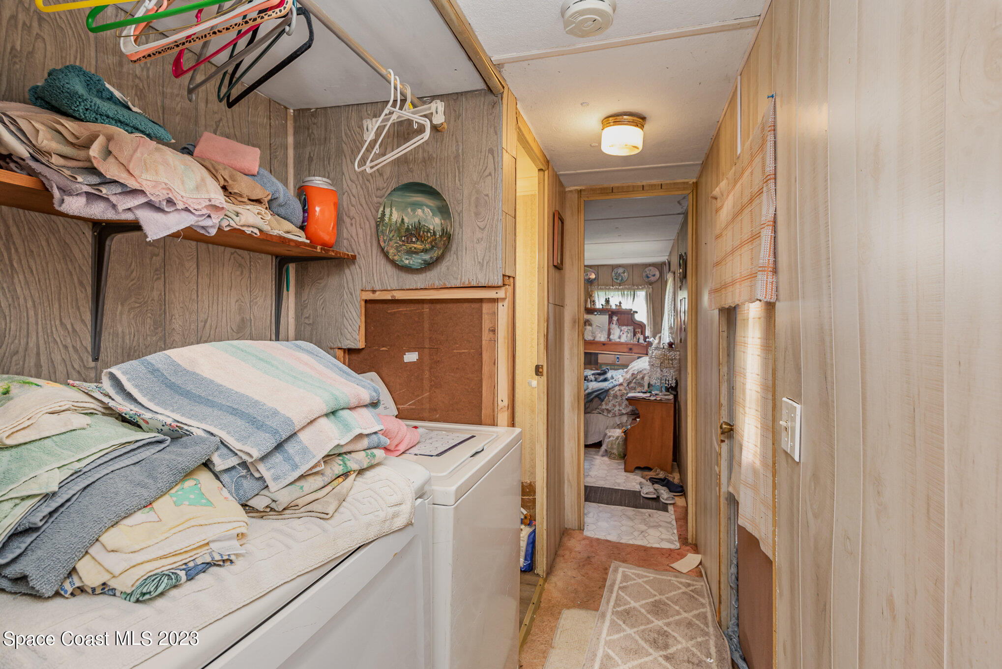 4173 Aurantia Road Mims, FL 32754 - Photo 17 of 23 a utility room with dryer and washer