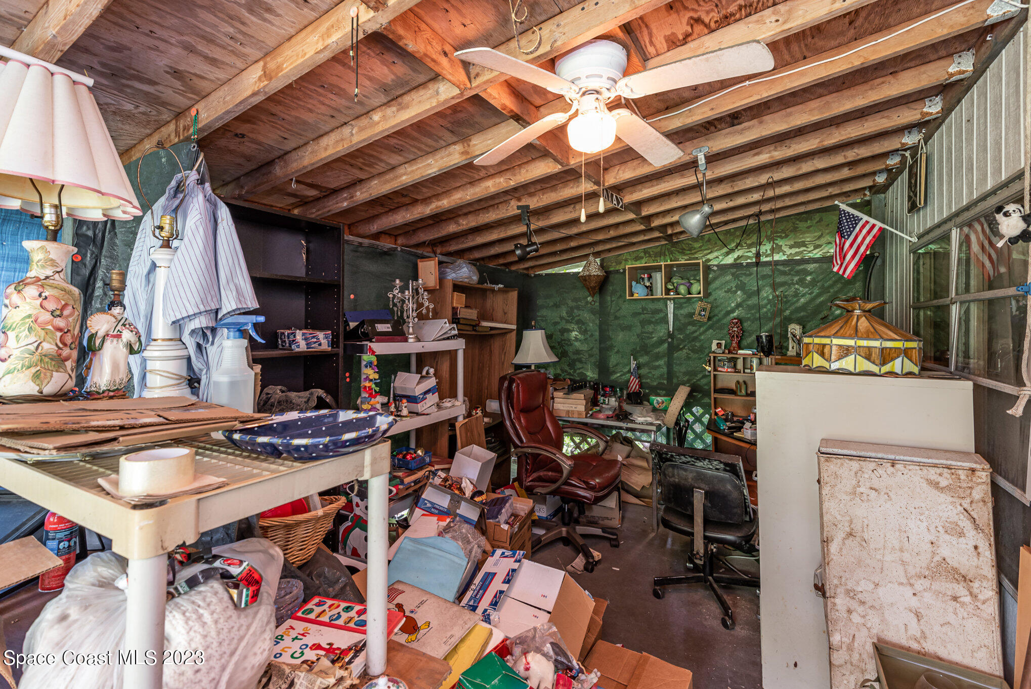 4173 Aurantia Road Mims, FL 32754 - Photo 18 of 23 a view of storage and utility room