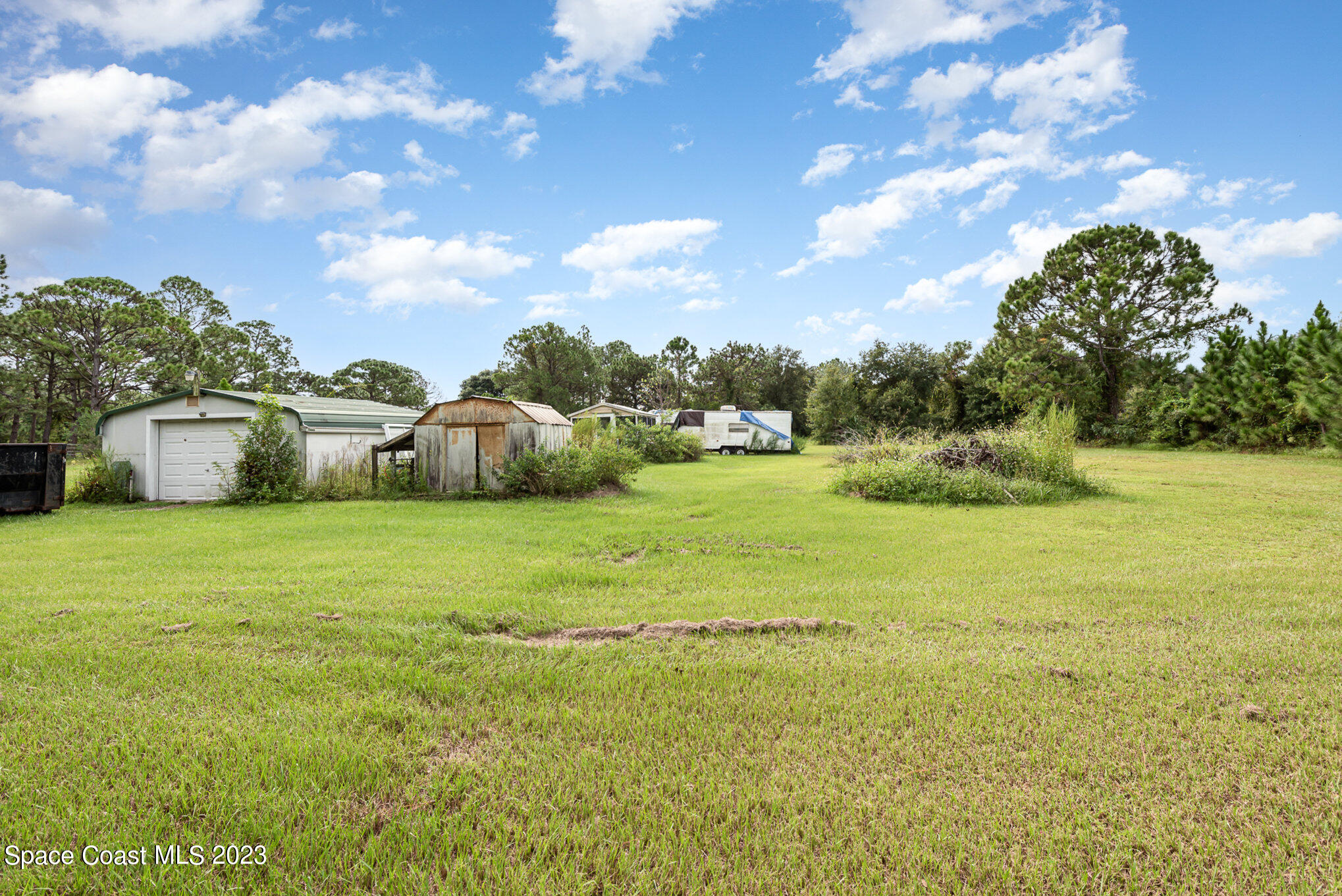 4173 Aurantia Road Mims, FL 32754 - Photo 21 of 23 a view of an ocean and beach