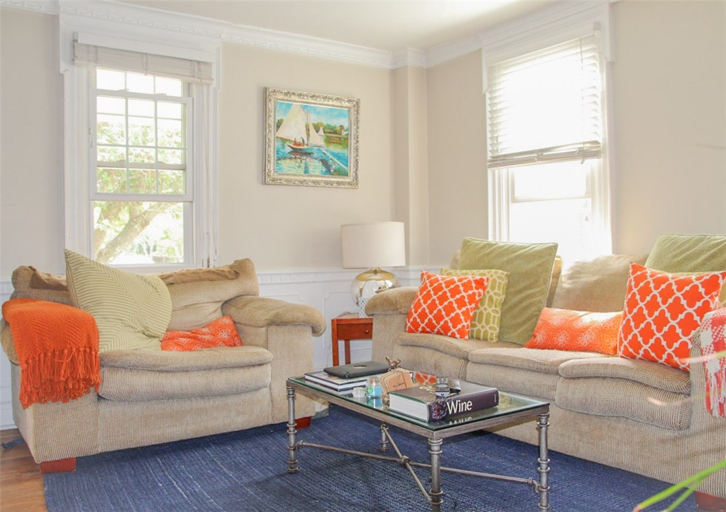 27 State Street Warren, RI 02885 - Photo 4 of 10 A Living Room enhanced with elegant woodwork.