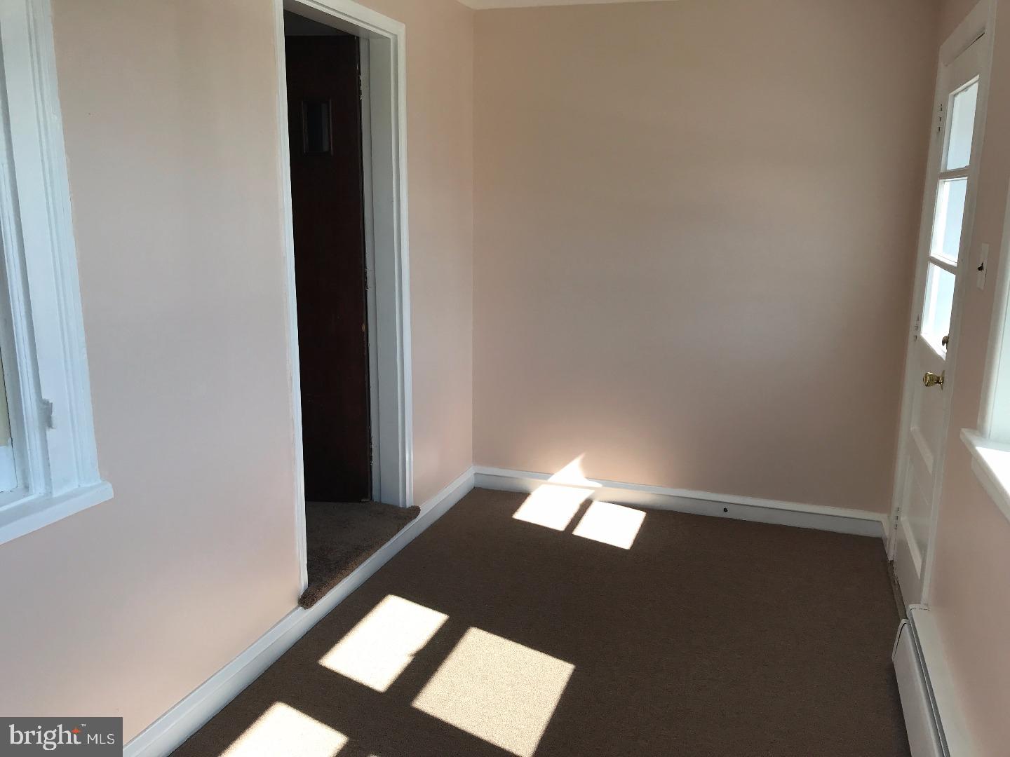 865 Lancaster Avenue Wayne, PA 19087 - Photo 6 of 13 a view of an empty room and window