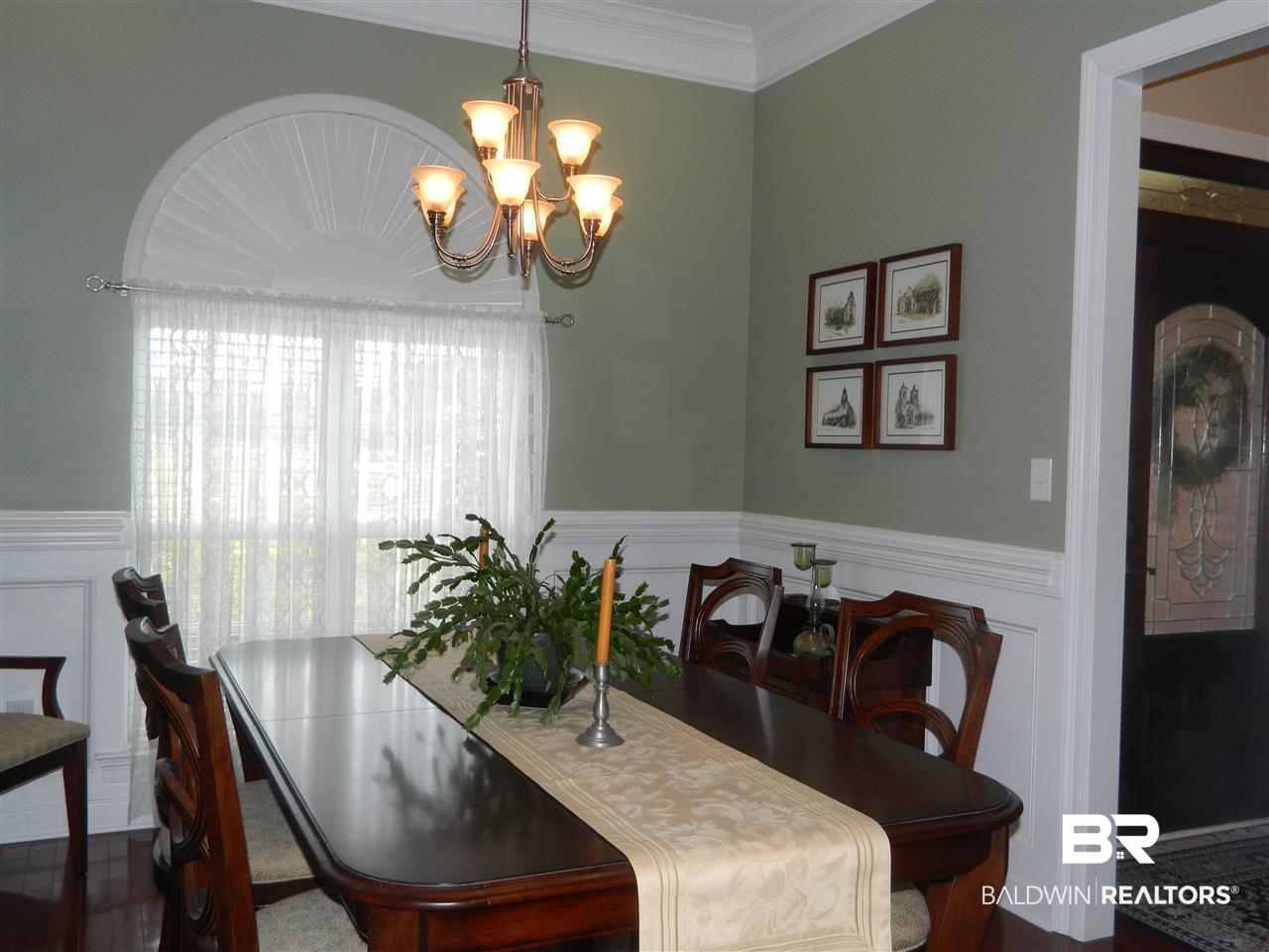3990 Symphony Way West Semmes, AL 36575 - Photo 6 of 45 Separate dining room, beautiful flooring & trim.