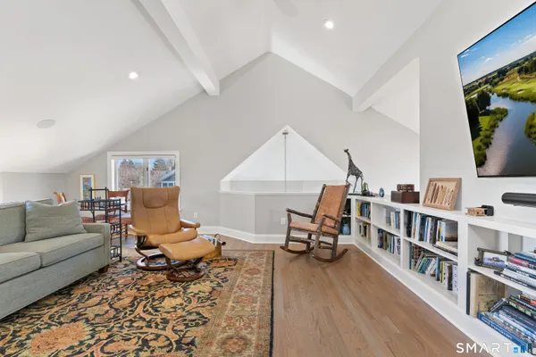 a bedroom with a bed and furniture