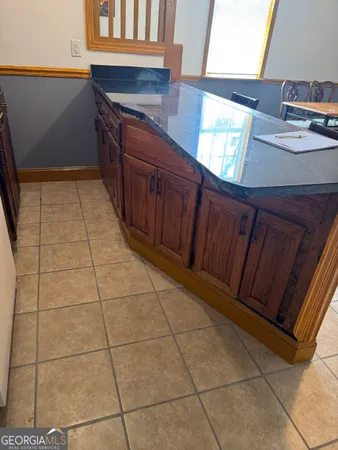 a view of a utility room with windows