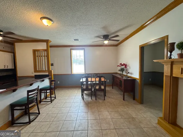 a lobby with furniture and wooden floor