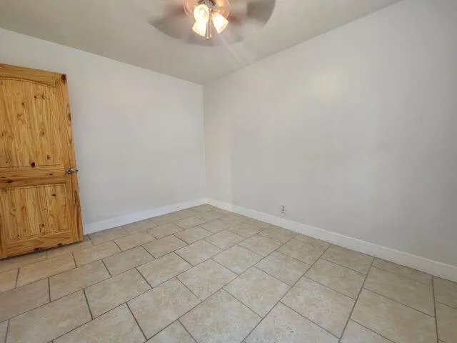 en empty room with windows