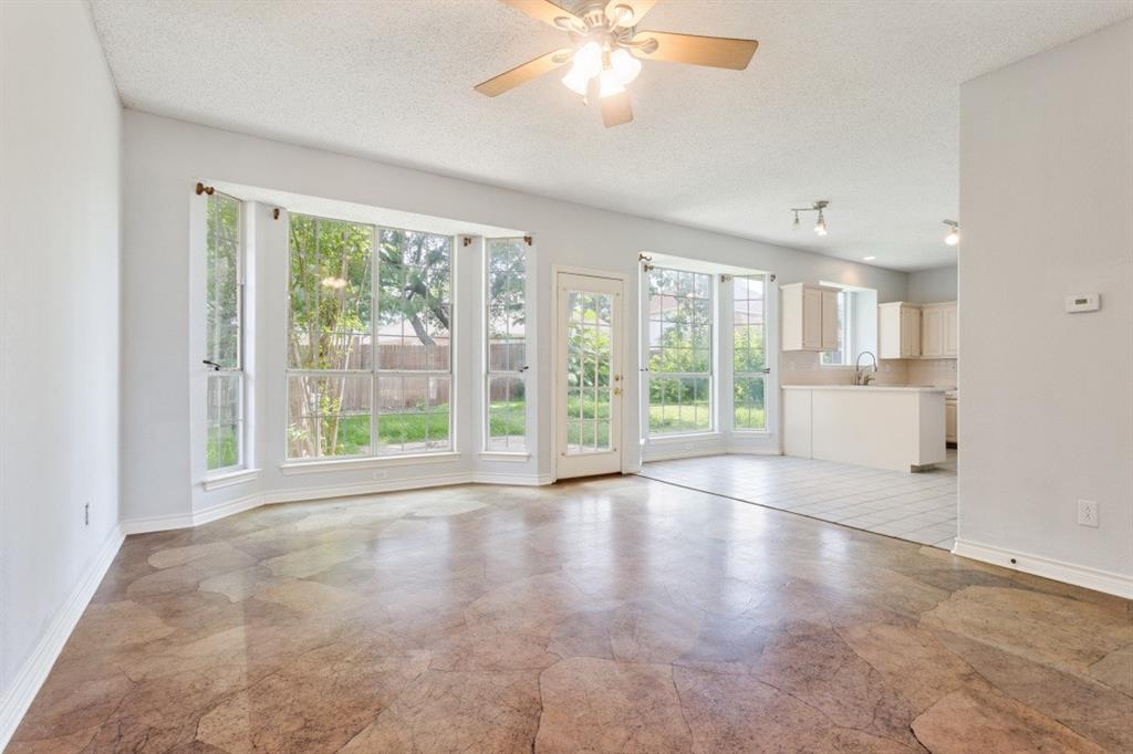 4709 Portrait Lane Plano, TX 75024 - Photo 13 of 22 Family Room with expansive backyard views.