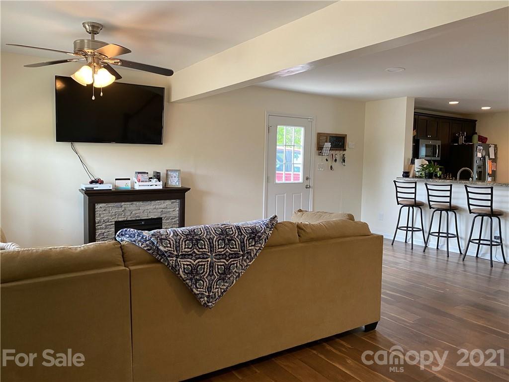 7300 Dan Rhyne Road Vale, NC 28168 - Photo 3 of 23 a living room with furniture and a flat screen tv