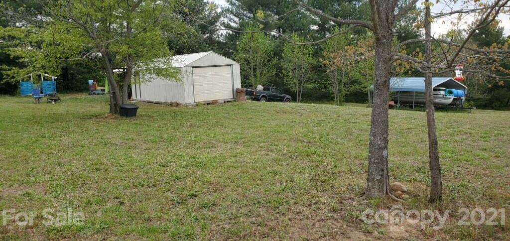 7300 Dan Rhyne Road Vale, NC 28168 - Photo 23 of 23 a backyard of a house with lots of green space