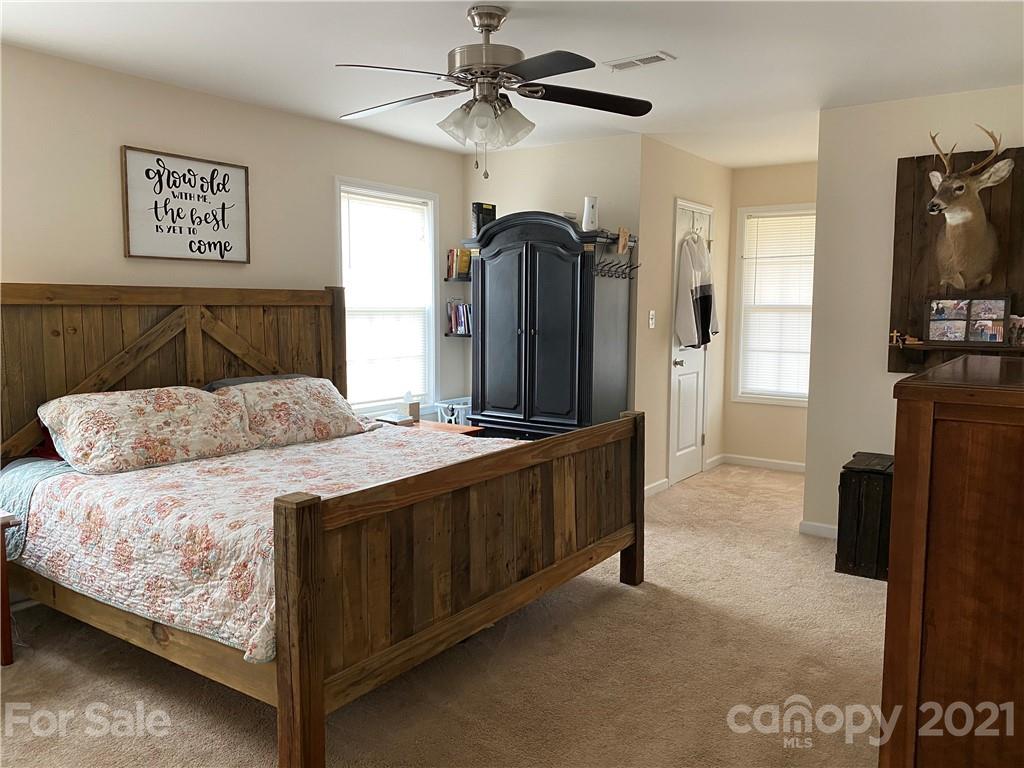 7300 Dan Rhyne Road Vale, NC 28168 - Photo 9 of 23 a bedroom with a bed and a television