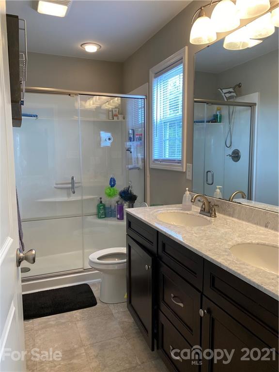 7300 Dan Rhyne Road Vale, NC 28168 - Photo 10 of 23 a bathroom with a sink a toilet and shower