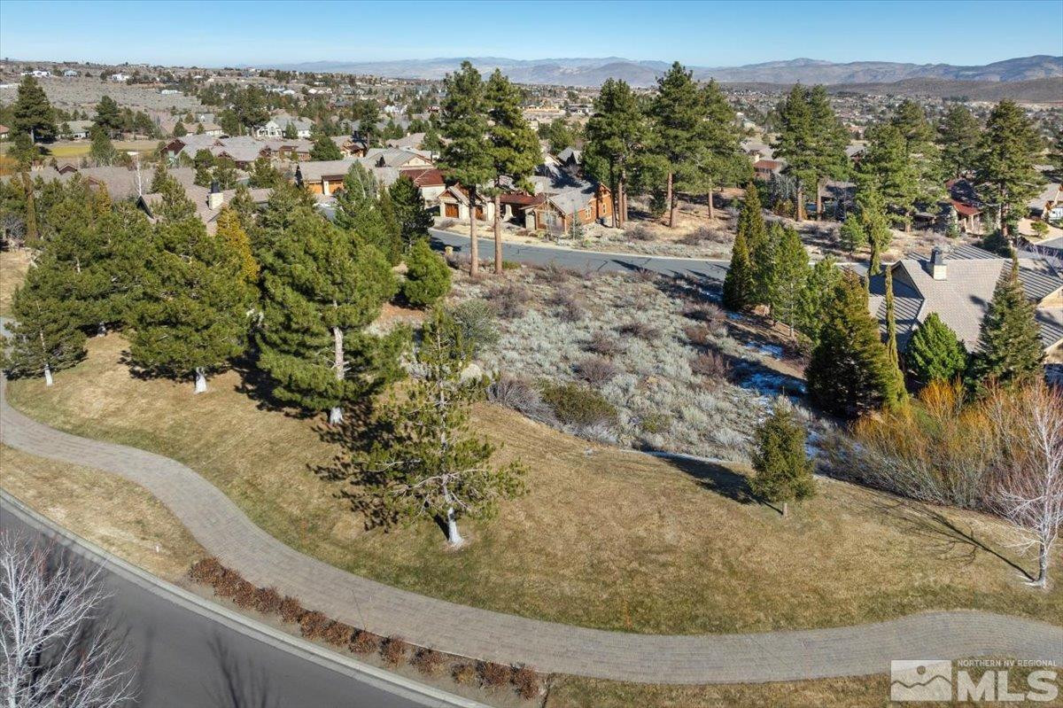 5715 Nordend Way, Unit 1008 Reno, NV 89511 - Photo 9 of 13 a view of a park with large trees