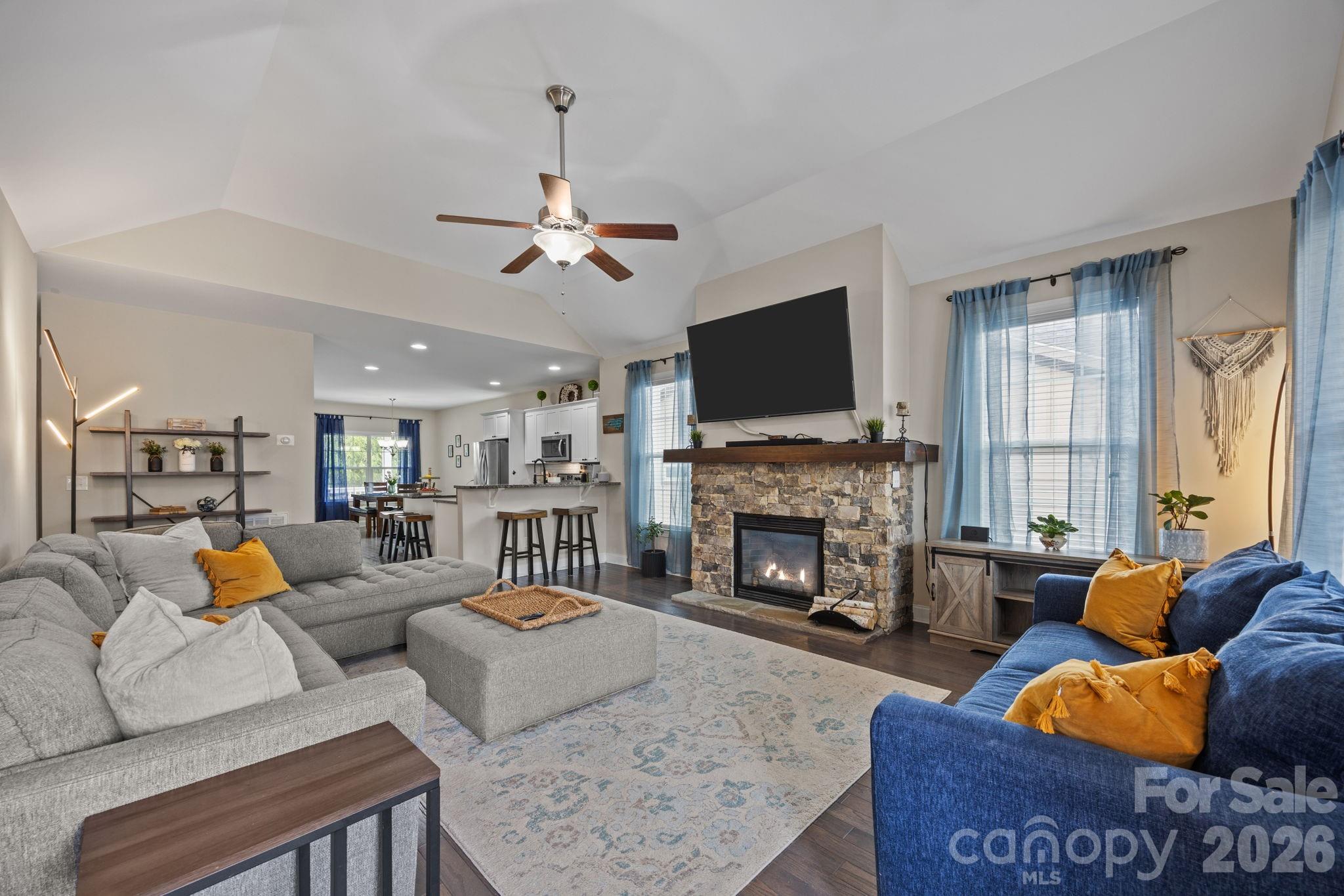 3 Dreambird Road Leicester, NC 28748 - Photo 11 of 48 a living room with furniture fireplace and a flat screen tv