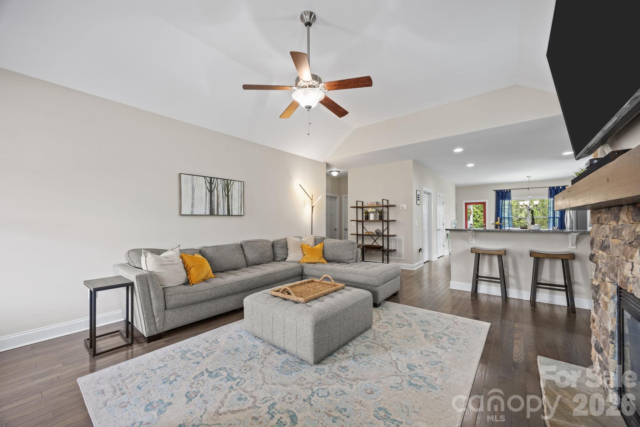 3 Dreambird Road Leicester, NC 28748 - Photo 12 of 48 a living room with furniture wooden floor and a flat screen tv