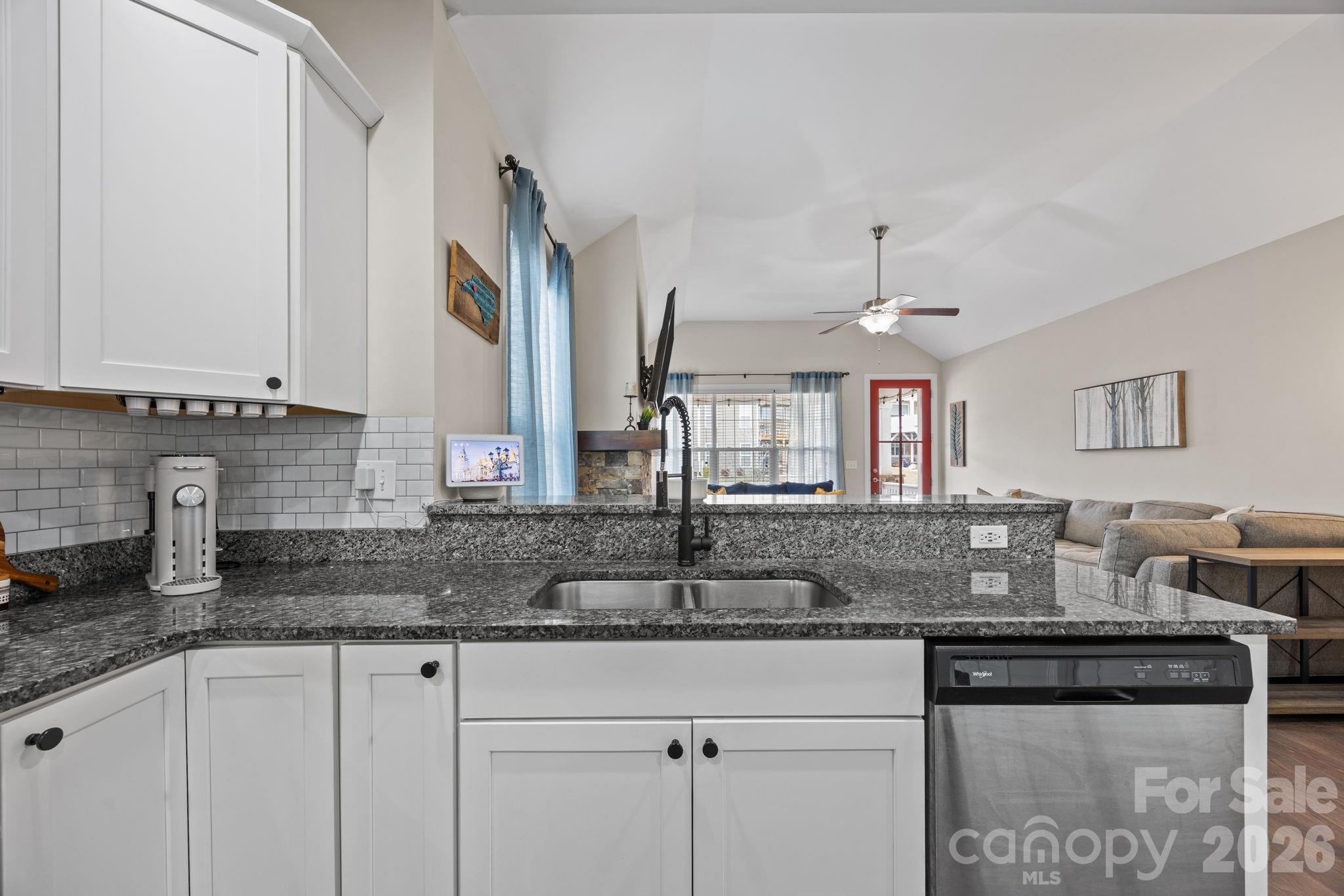 3 Dreambird Road Leicester, NC 28748 - Photo 18 of 48 a kitchen with stainless steel appliances granite countertop a sink and cabinets
