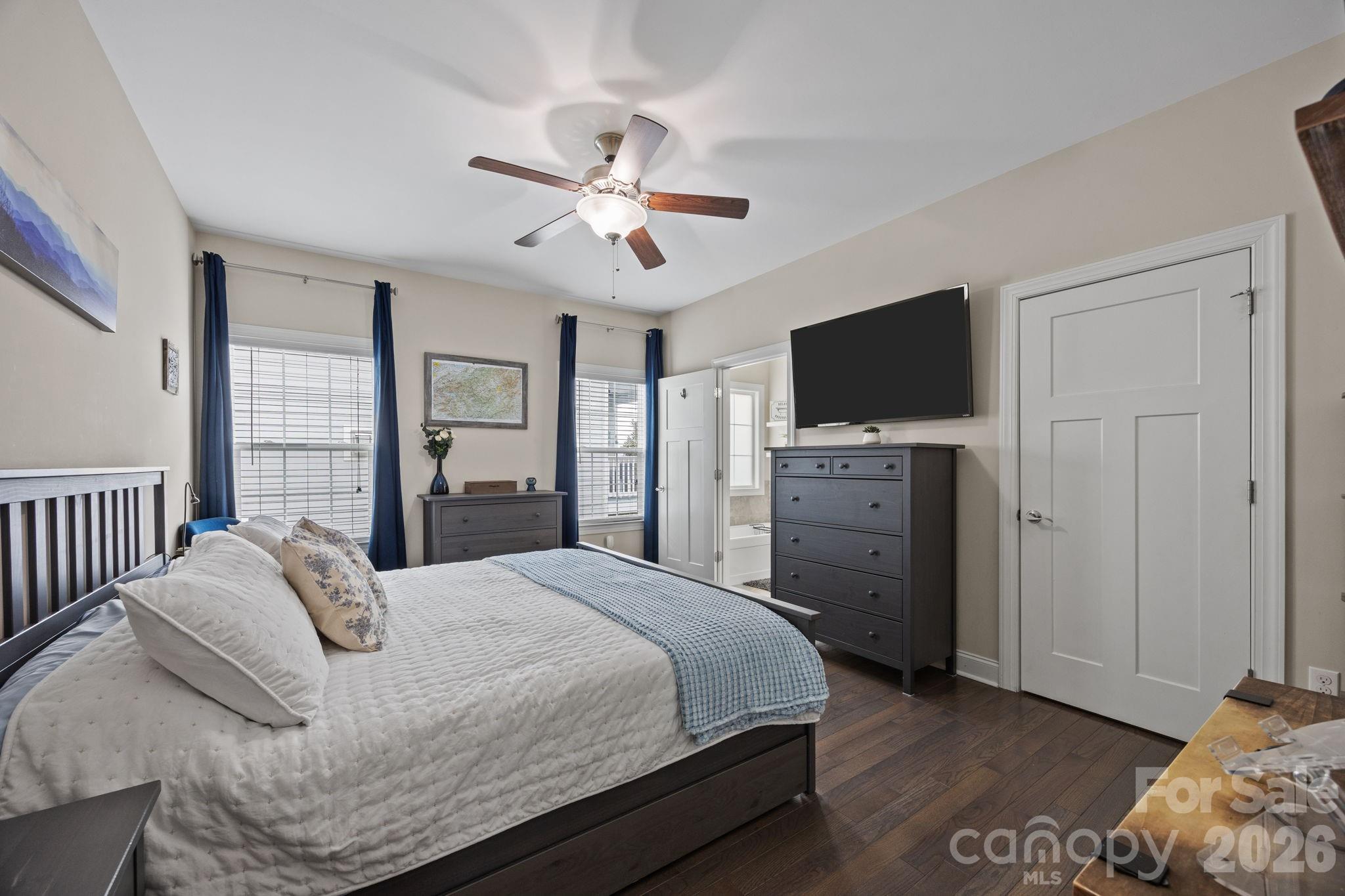 3 Dreambird Road Leicester, NC 28748 - Photo 23 of 48 a bedroom with a bed and a flat screen tv