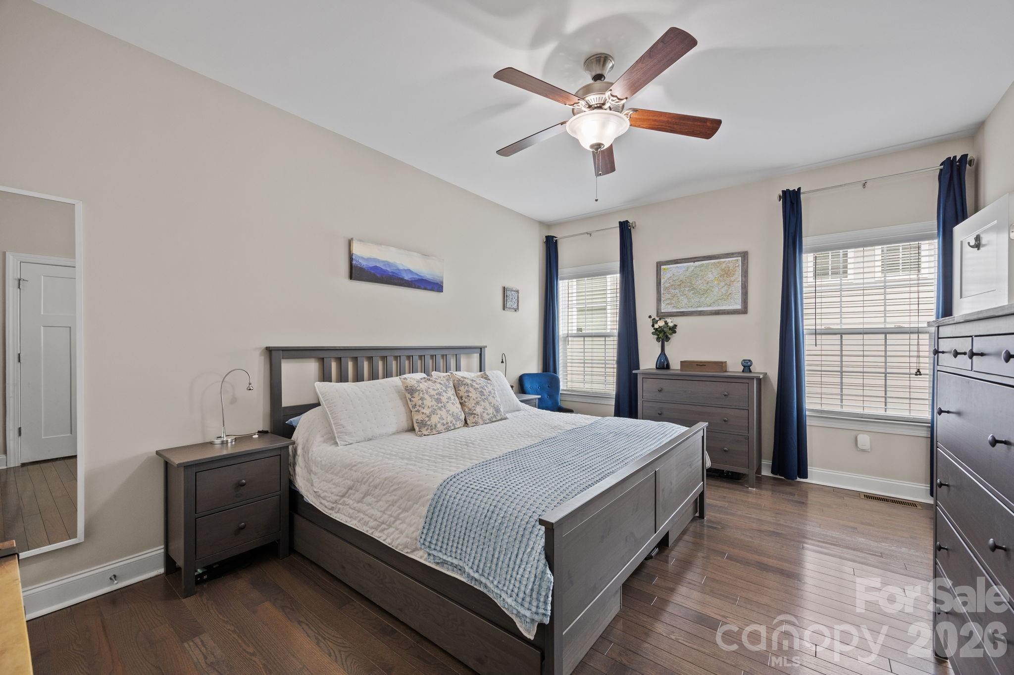 3 Dreambird Road Leicester, NC 28748 - Photo 24 of 48 a spacious bedroom with a bed and a cabinets