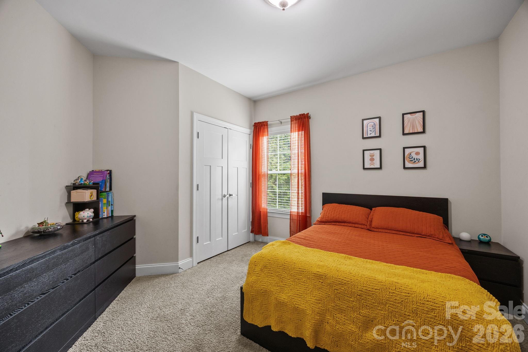 3 Dreambird Road Leicester, NC 28748 - Photo 30 of 48 a bedroom with a bed and wooden floor