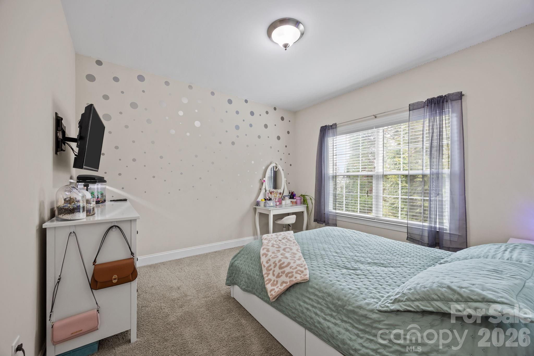 3 Dreambird Road Leicester, NC 28748 - Photo 31 of 48 a bedroom with a bed and a window