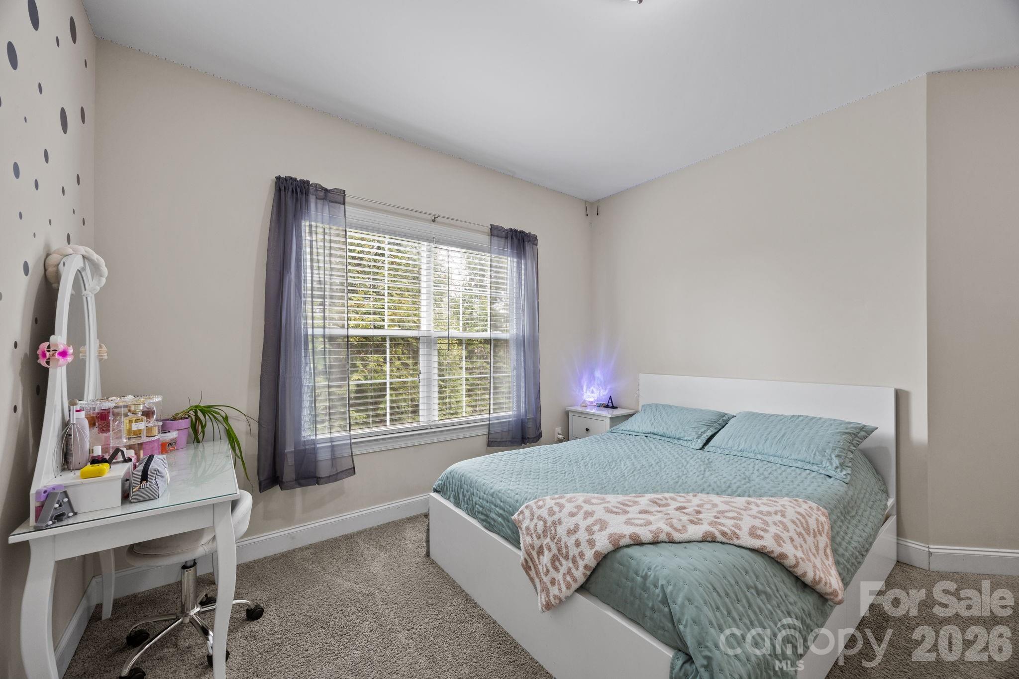 3 Dreambird Road Leicester, NC 28748 - Photo 32 of 48 a bedroom with a bed and a window