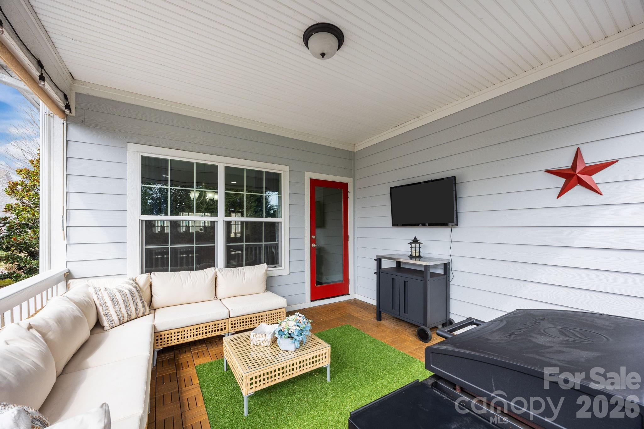 3 Dreambird Road Leicester, NC 28748 - Photo 39 of 48 a living room with furniture and a flat screen tv
