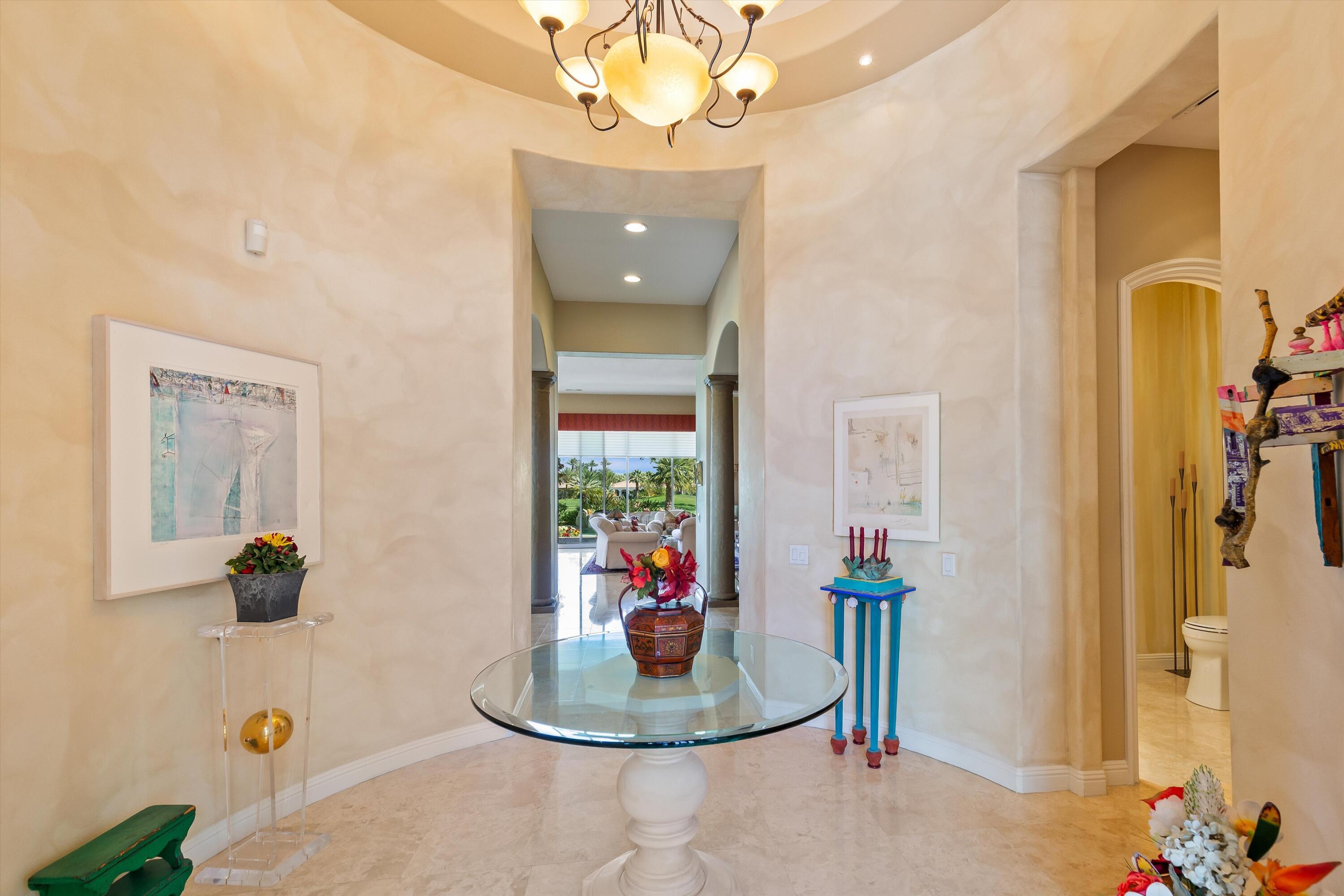 80460 Torreon Way La Quinta, CA 92253 - Photo 11 of 32 a view of a dining room with a table and chairs