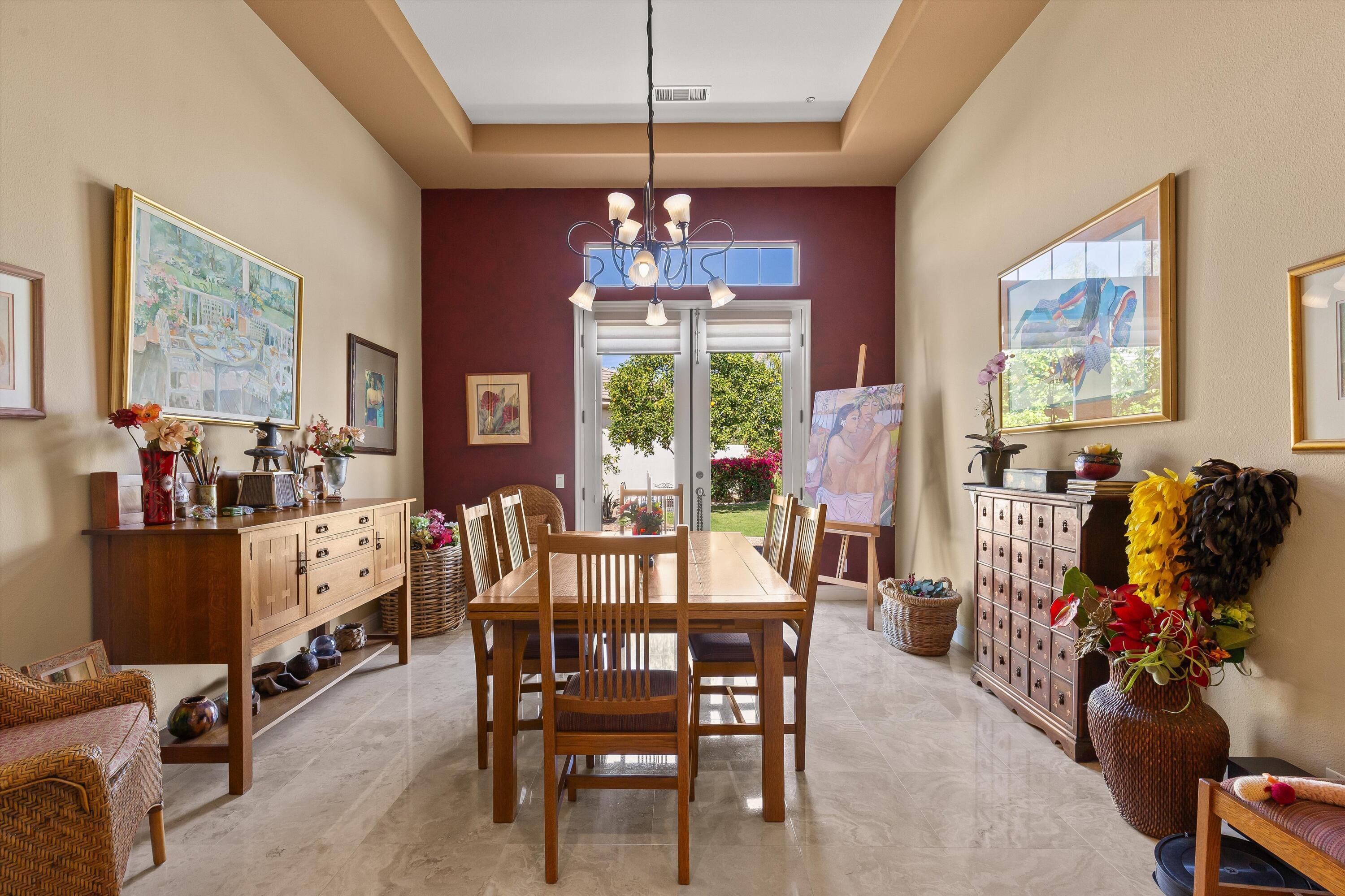 80460 Torreon Way La Quinta, CA 92253 - Photo 12 of 32 a view of a dining room with furniture window and outside view